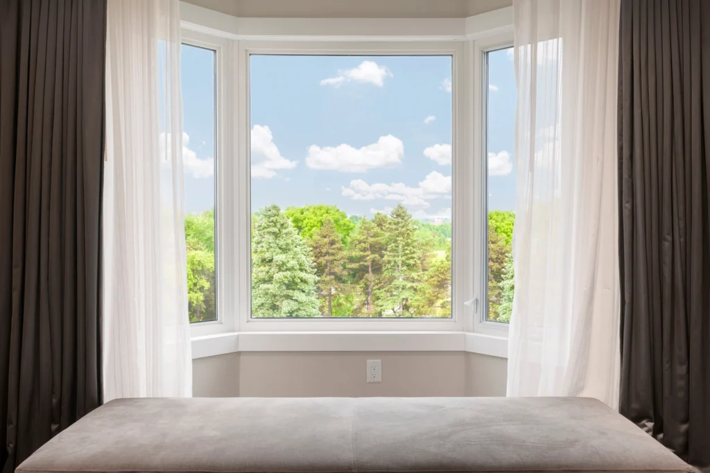 replacing a flat window with a bay window